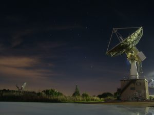 Satellite under the night sky